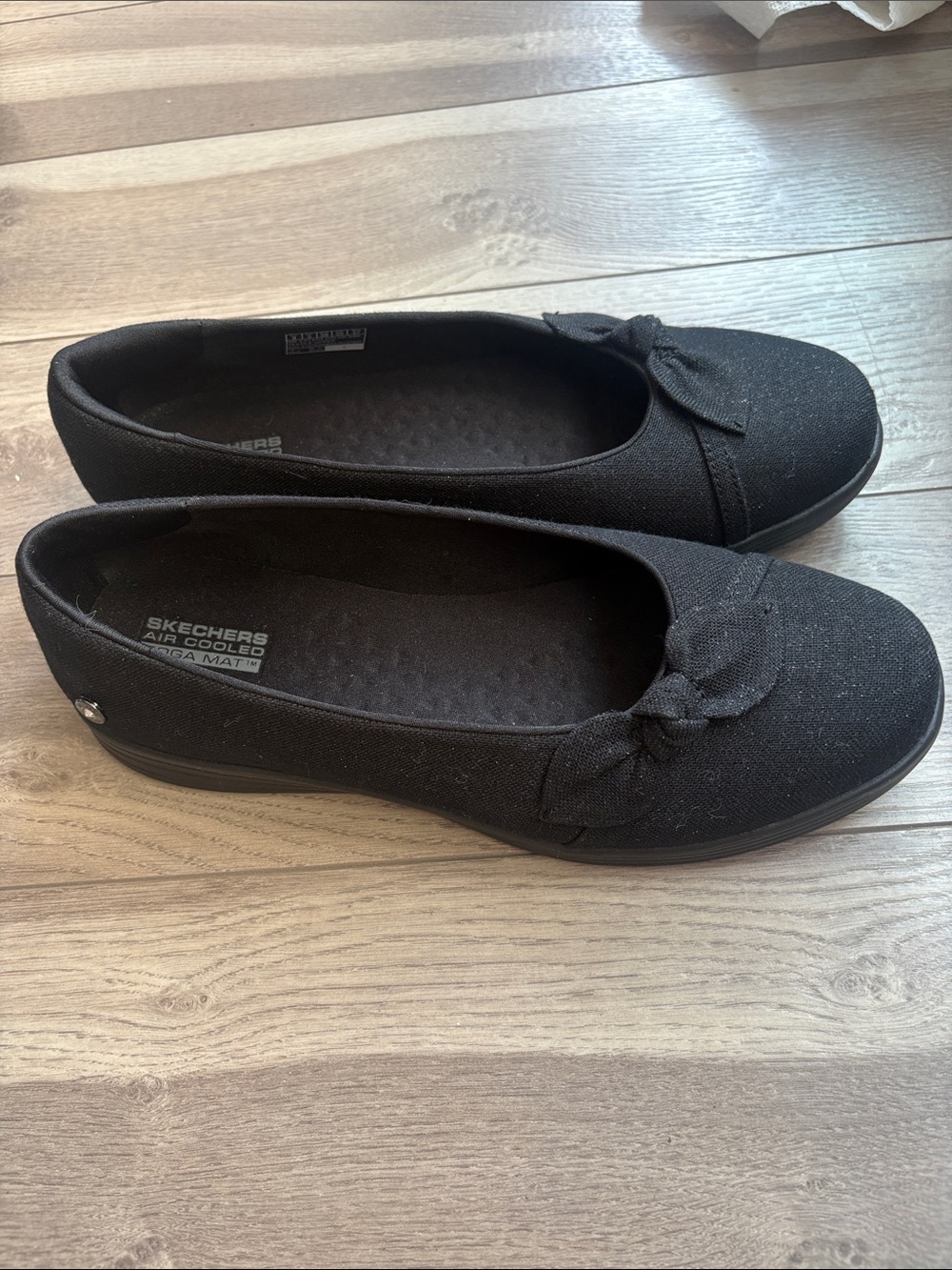 Skechers Black with glitter Women's Slip-On Flats with Bow Accent